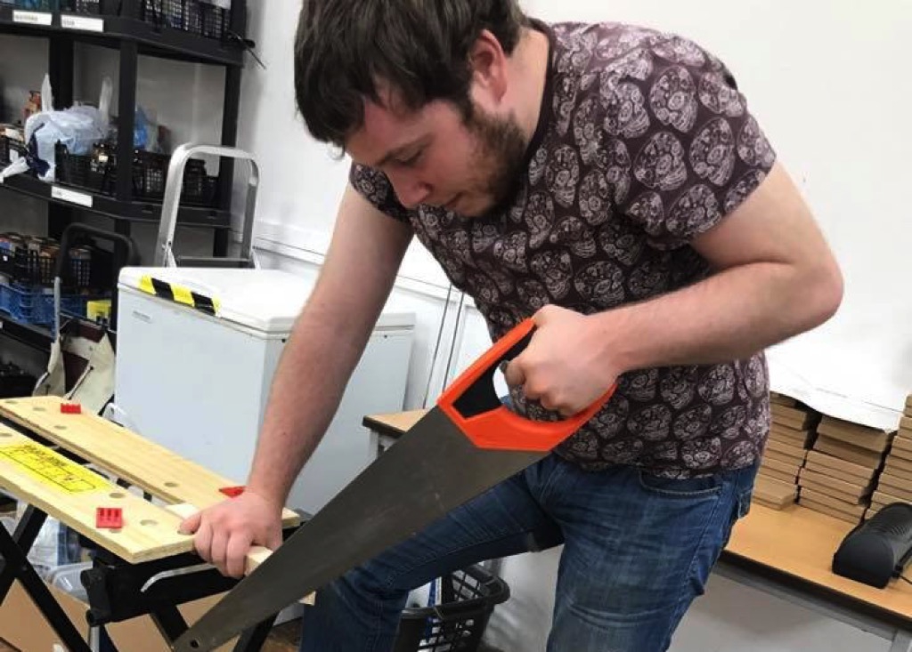 Learning woodworking skills at Sweet Surprise